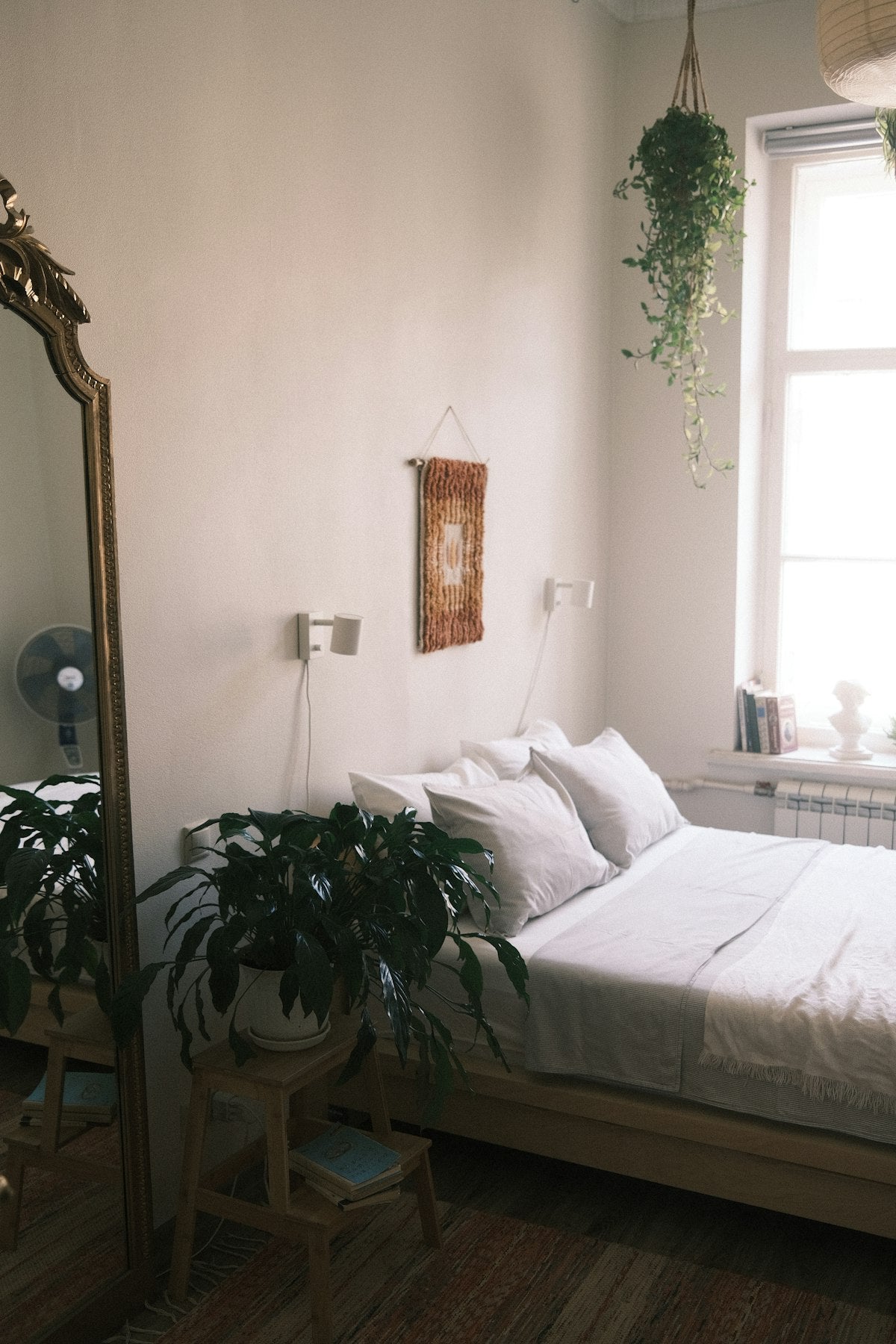 Bed with a book and cozy setting