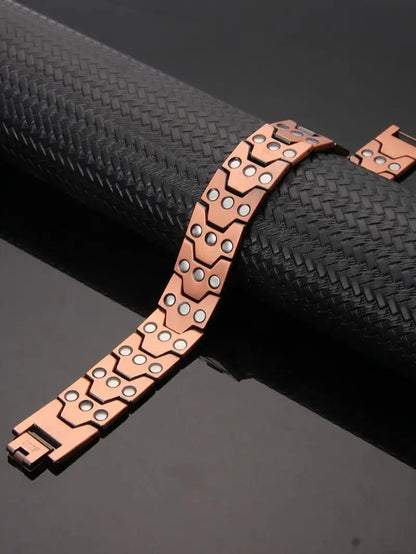 A Red Copper Magnetic Energy Bracelet with Magnets, Featuring Functions of Relieving Fatigue, Promoting Blood Circulation and Alleviating Joint Discomfort. It Is Suitable as a Gift for Father'S Day or for Giving as a Birthday Present to Elders.