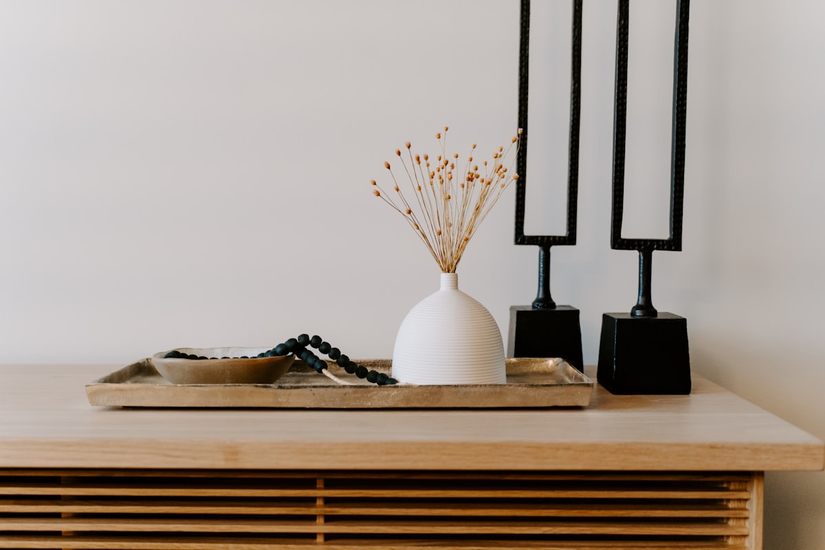 White ceramic vase with table decor