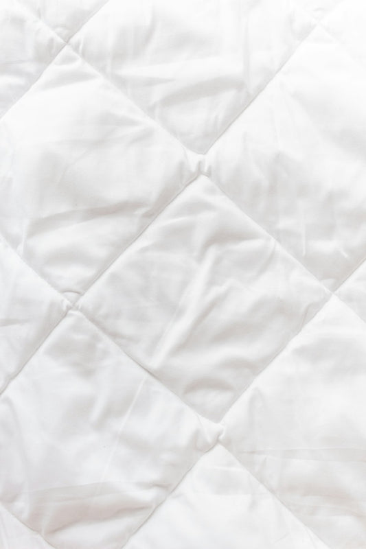 Soft quilted weighted blanket texture