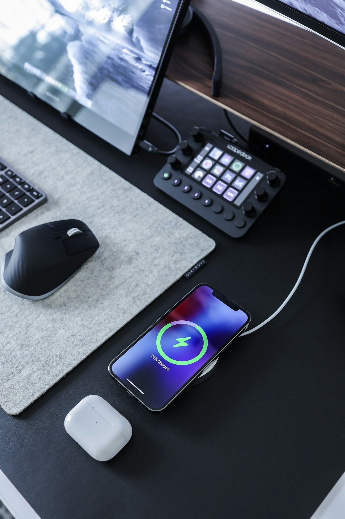 Computer mouse beside keyboard