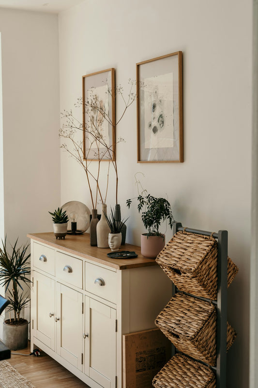Brown woven basket on a white cabinet