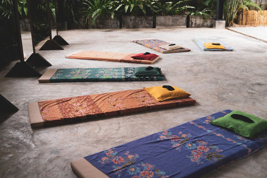 Yoga mats arranged on the floor